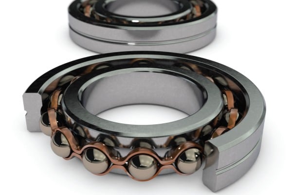 A hybrid bearing featuring black silicon nitride ceramic balls against steel rings for electrical isolation.