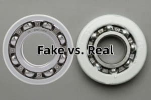 A side-by-side comparison of a genuine TFL plasma-sprayed insulated bearing and a counterfeit painted bearing for VFD motors.